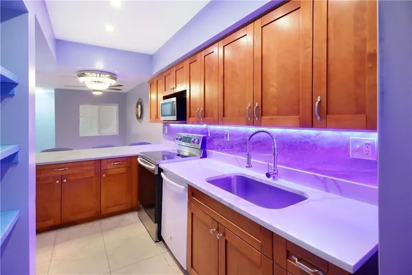 a spacious bathroom with a double vanity sink and a mirror