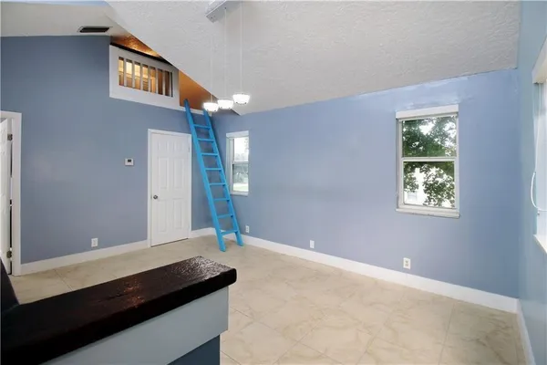 a view of an empty room with window