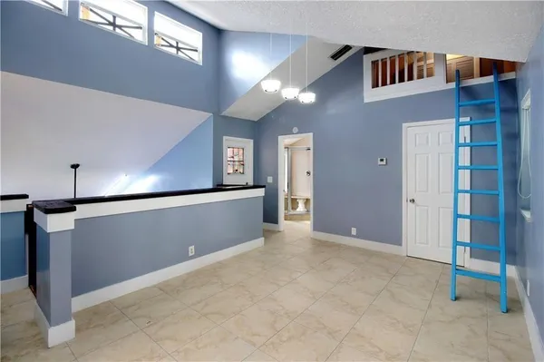 a view of a hallway with entryway