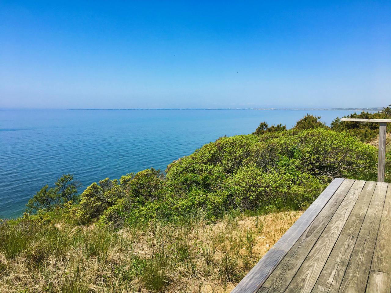 62 Corn Hill Road, Unit 6 Truro, MA 02666 - Photo 3 of 19 a view of ocean from a balcony