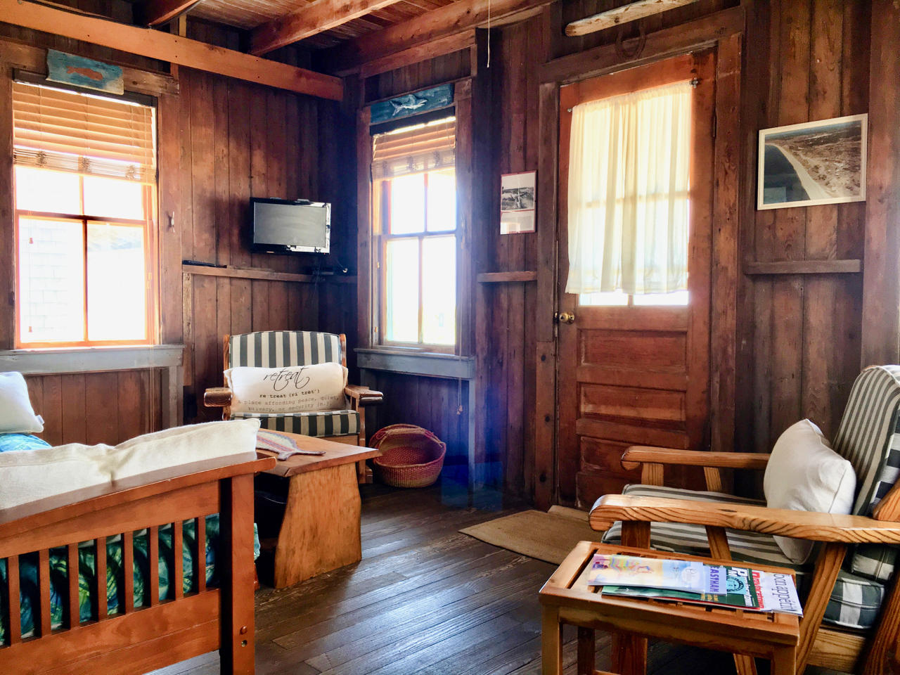 62 Corn Hill Road, Unit 6 Truro, MA 02666 - Photo 7 of 19 a bedroom with furniture and a window