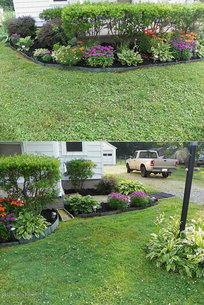 Beautiful view of the landscaping in the spring a few years back.