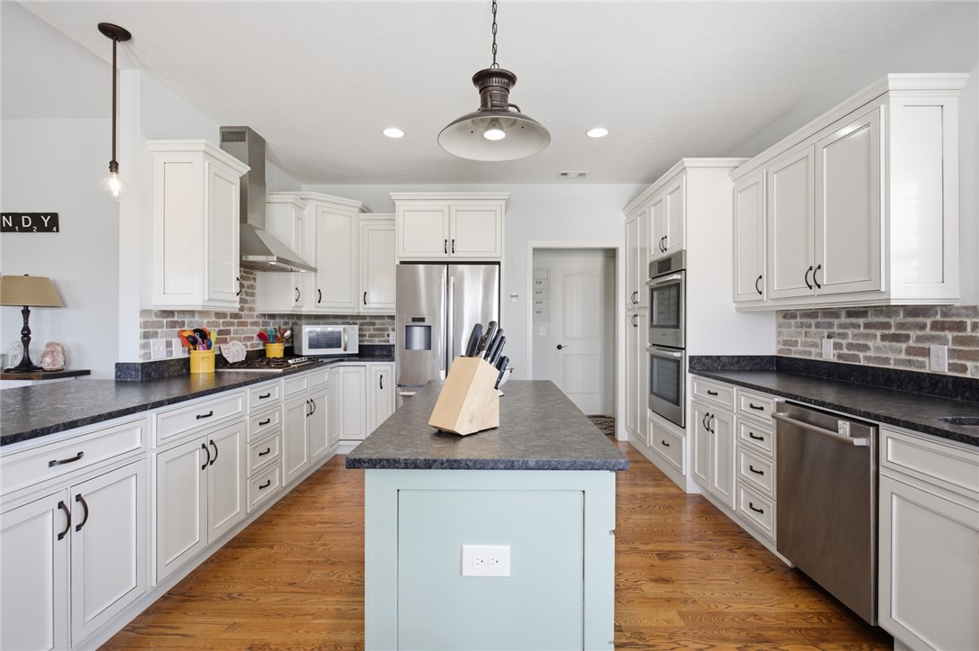 426 Oak Creek Road Seneca, SC 29678 - Photo 12 of 50 This expansive kitchen features ample counter space and abundant storage, perfect for culinary enthusiasts.