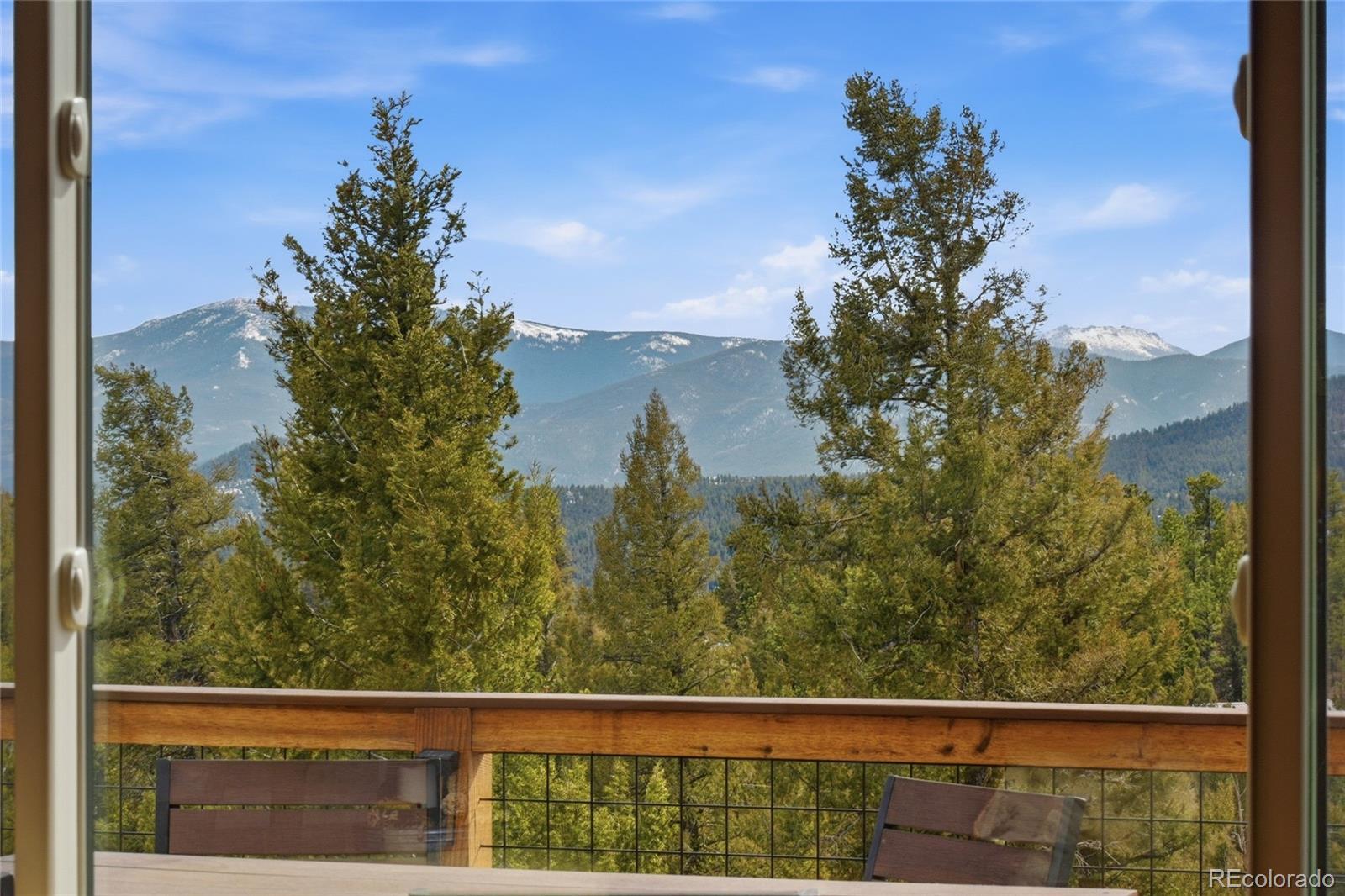 1146 Tapadero Road Bailey, CO 80421 - Photo 24 of 28 a view of a lake from a window