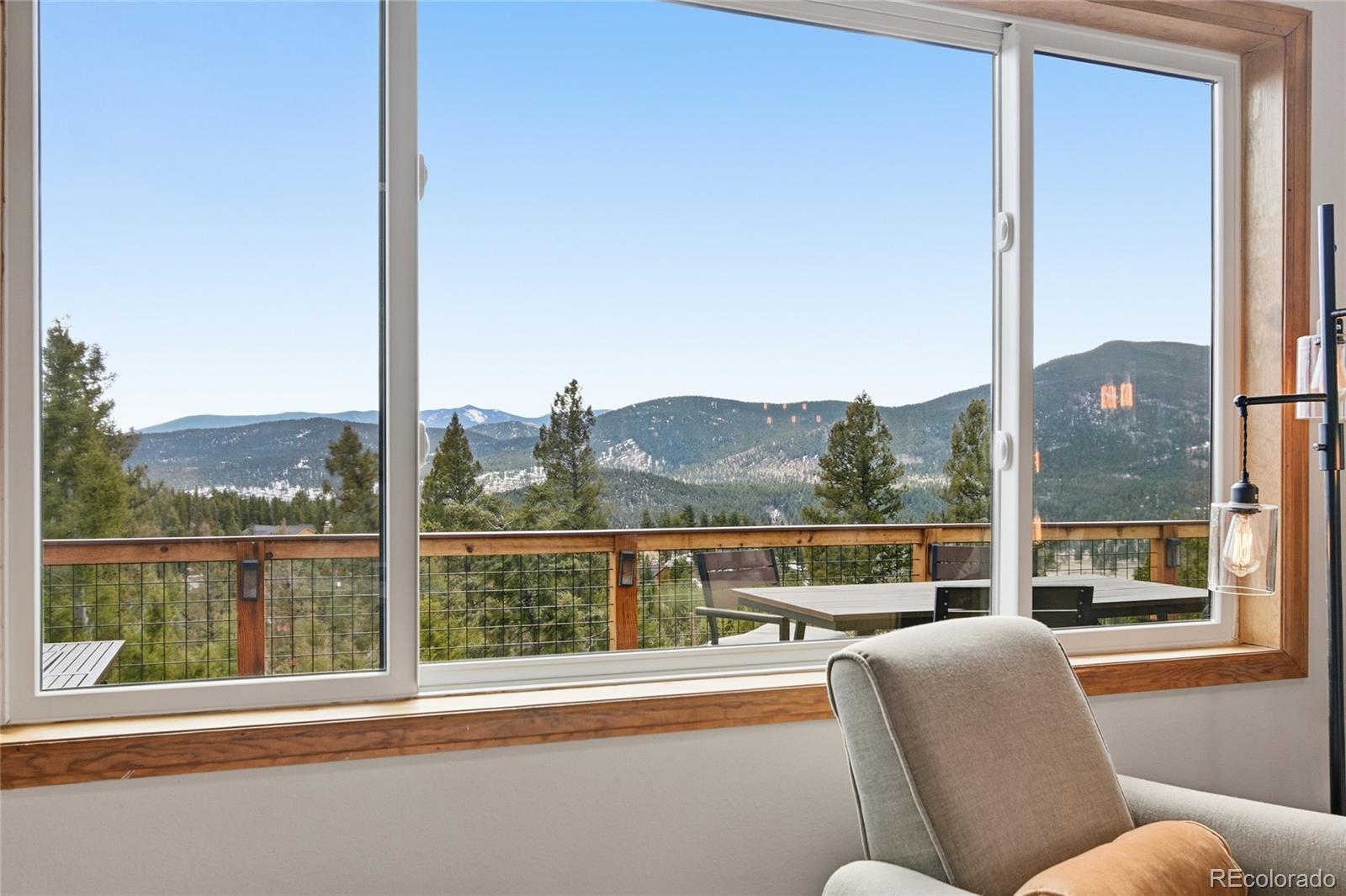 1146 Tapadero Road Bailey, CO 80421 - Photo 4 of 28 a view of a city from a window
