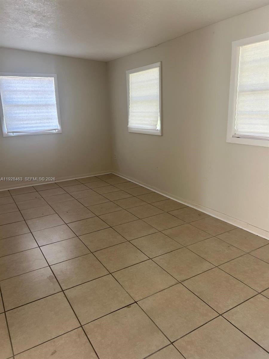 1599 Northeast Cindy Circle, Unit A Palm Bay, FL 32905 - Photo 8 of 13 a view of room and window