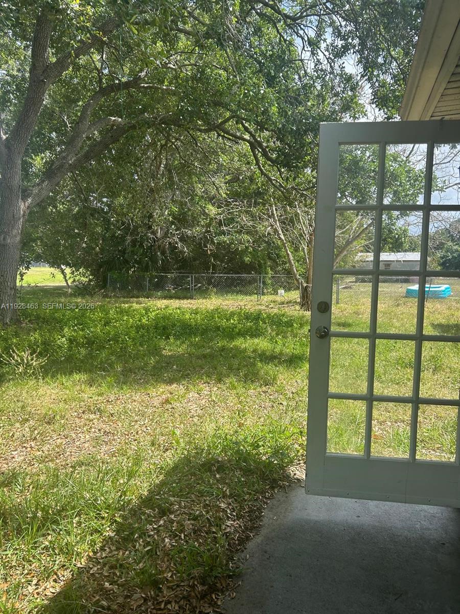 1599 Northeast Cindy Circle, Unit A Palm Bay, FL 32905 - Photo 10 of 13 a view of outdoor space and yard