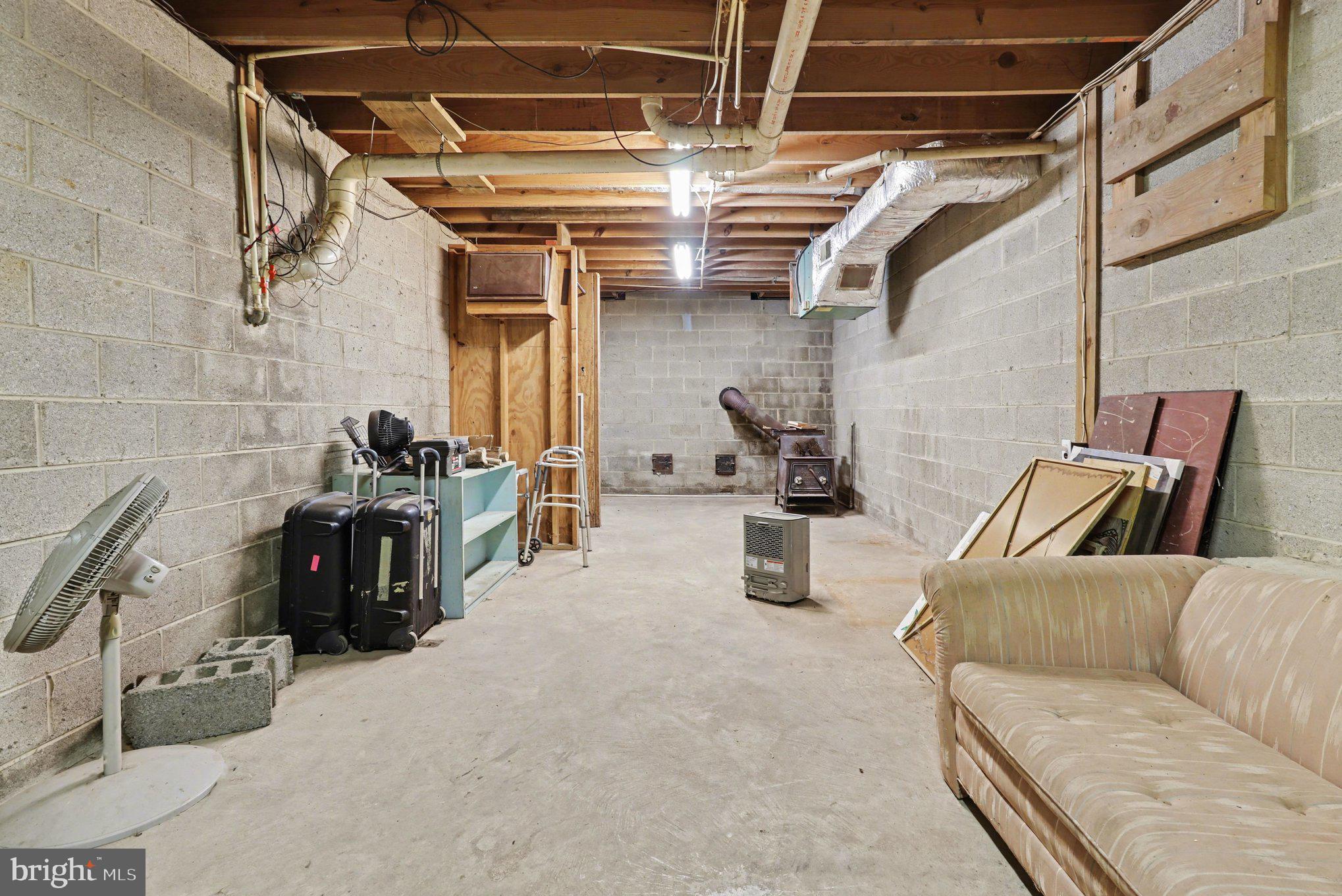 306 Jones Creek Road Warsaw, VA 22572 - Photo 32 of 40 Unfinished basement