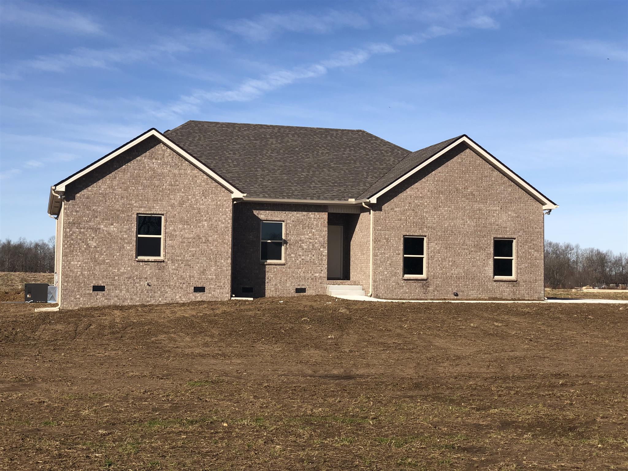 891 Elrod Road Manchester, TN 37355 - Photo 1 of 1 a front view of a house with a garden