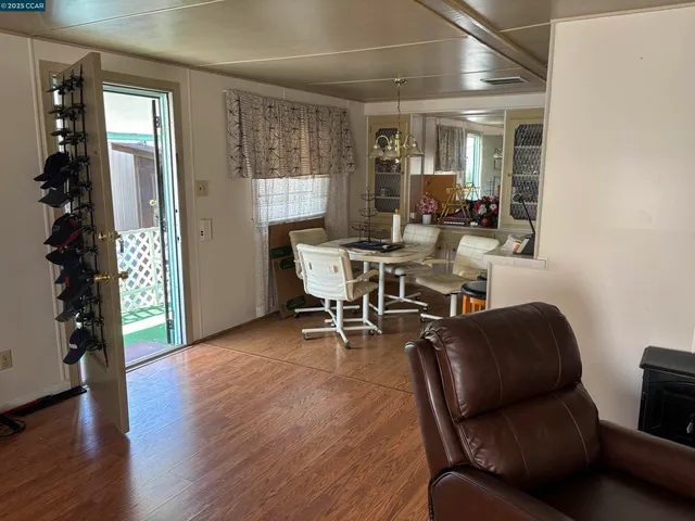 a kitchen with a sink a stove and cabinets