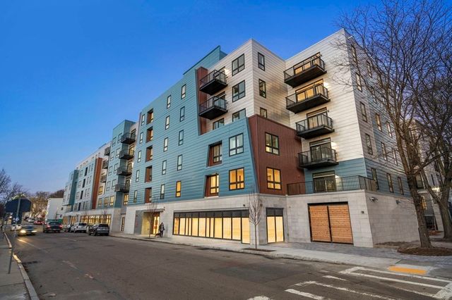 a view of a building with a street