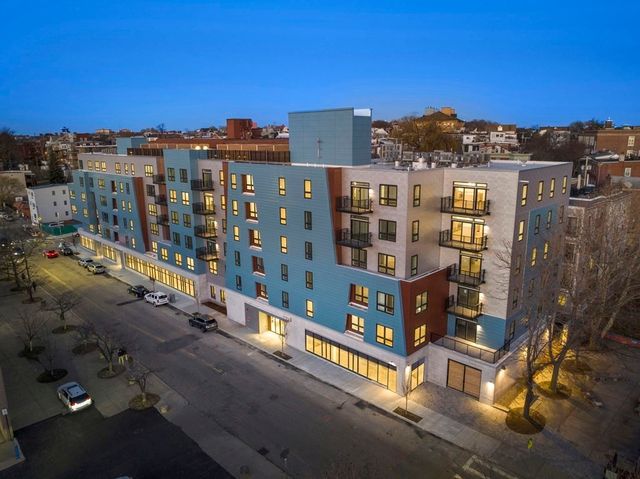a view of a city with tall buildings