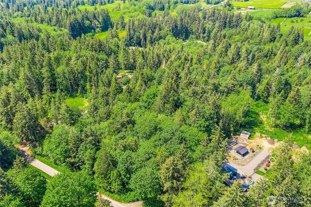 a view of a lake with a big yard