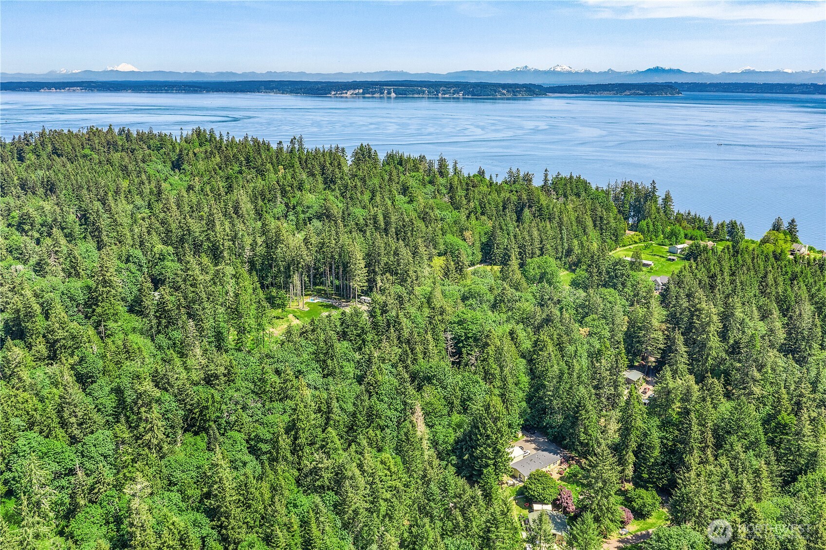 0 Pilot Point Road Northeast Kingston, WA 98346 - Photo 15 of 21 a view of a lake with a big yard
