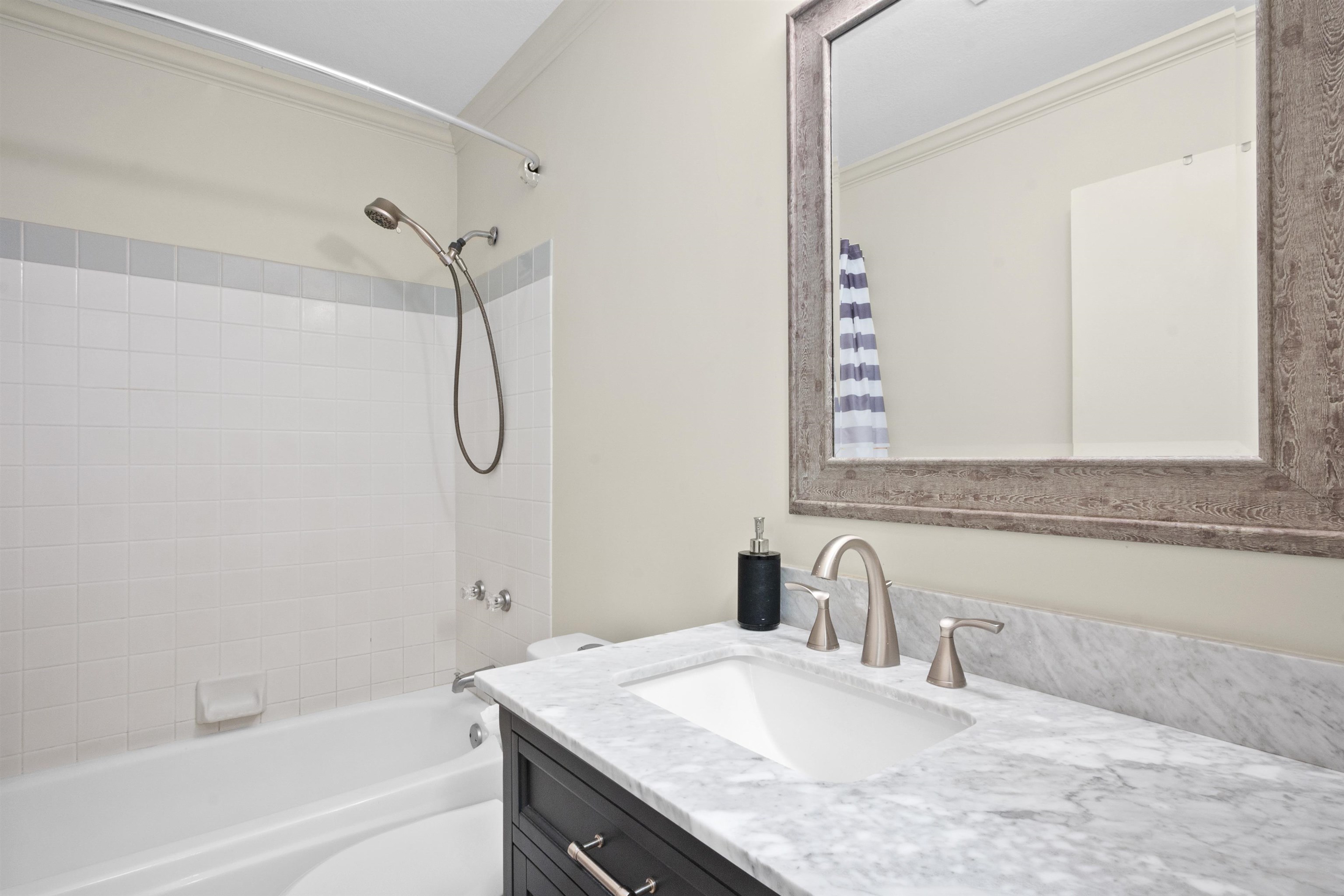 480 Kenolio Road, Unit 15103 Kihei, HI 96753 - Photo 12 of 36 a bathroom with a granite countertop sink and a mirror