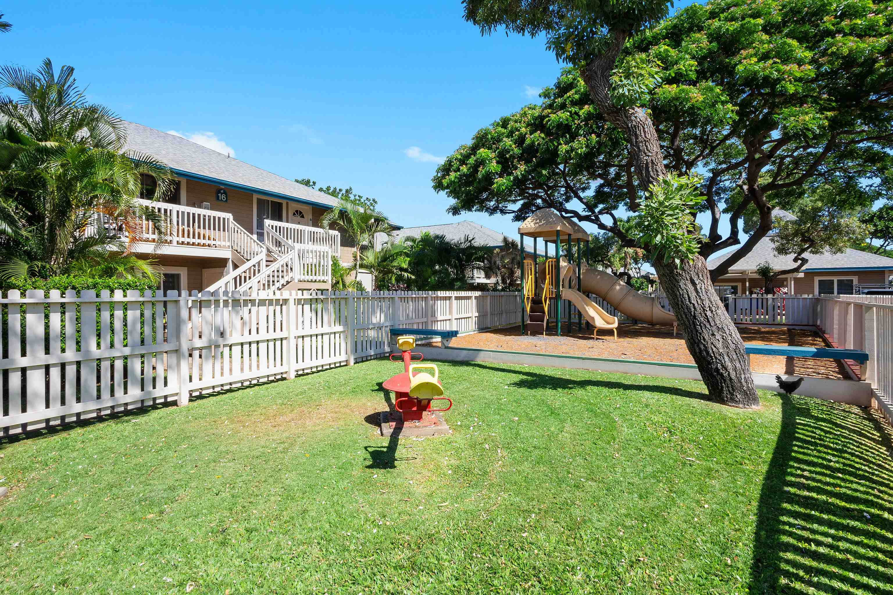 480 Kenolio Road, Unit 15103 Kihei, HI 96753 - Photo 27 of 36 a view of a backyard with a slide