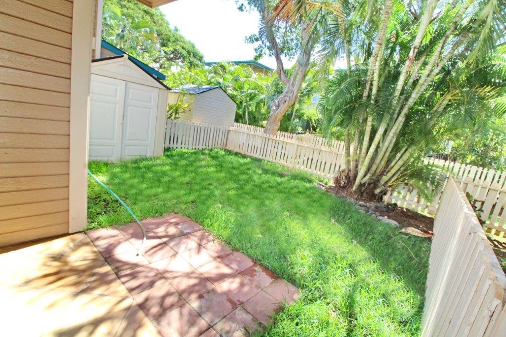 480 Kenolio Road, Unit 15103 Kihei, HI 96753 - Photo 32 of 36 a view of a backyard with a small cabin