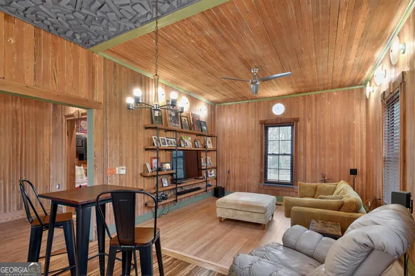 a patio with a table and chairs
