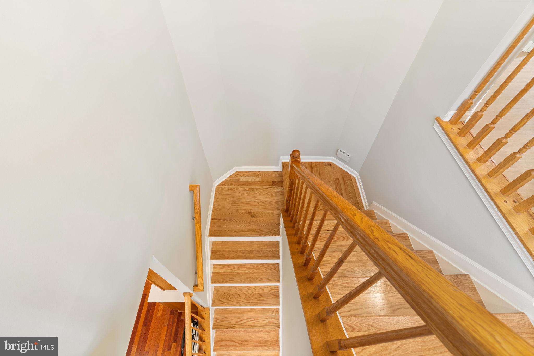 21654 Frame Square Broadlands, VA 20148 - Photo 39 of 43 Inviting staircase with warm wood tones.