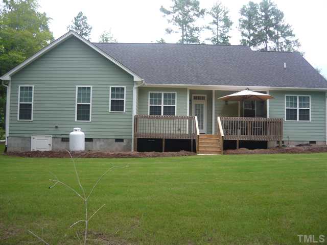 1528 Sedwick Road Durham, NC 27713 - Photo 16 of 18 a view of a house with a yard