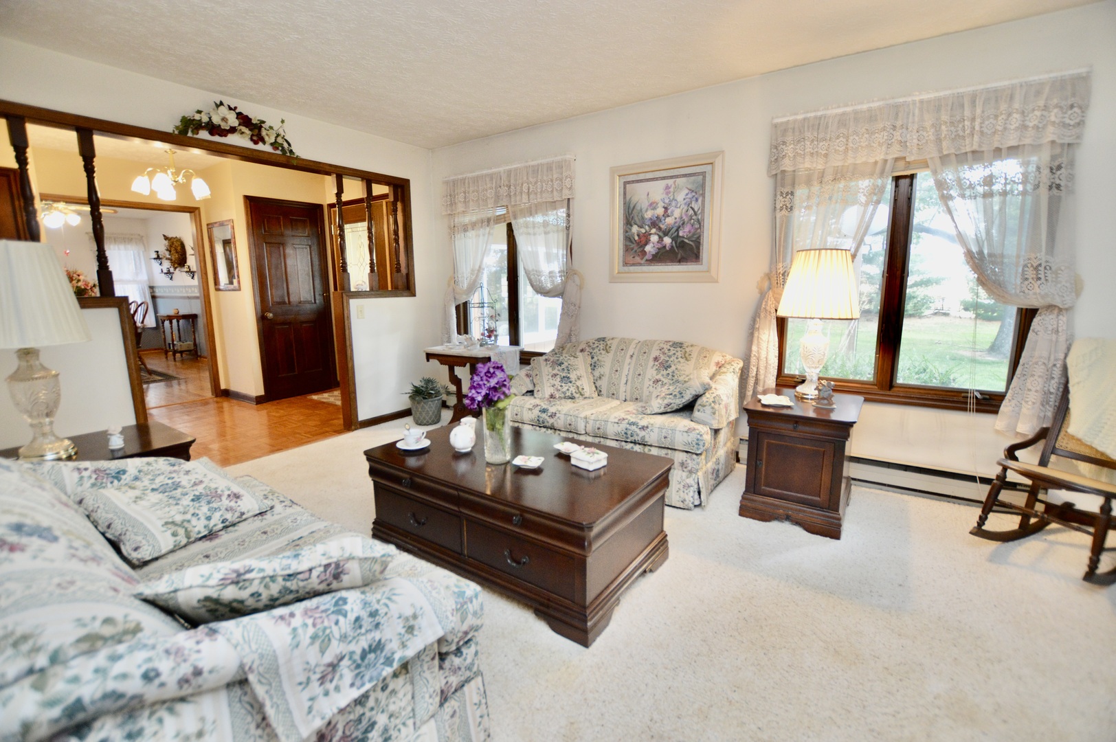 15758 Boone Mc Henry County Line Road Capron, IL 61012 - Photo 16 of 39 a living room with furniture bathtub and a large window