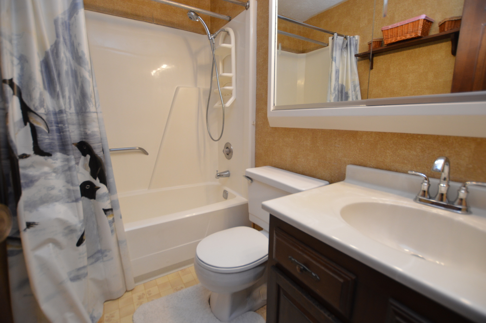 15758 Boone Mc Henry County Line Road Capron, IL 61012 - Photo 24 of 39 a bathroom with a sink a toilet and a bathtub