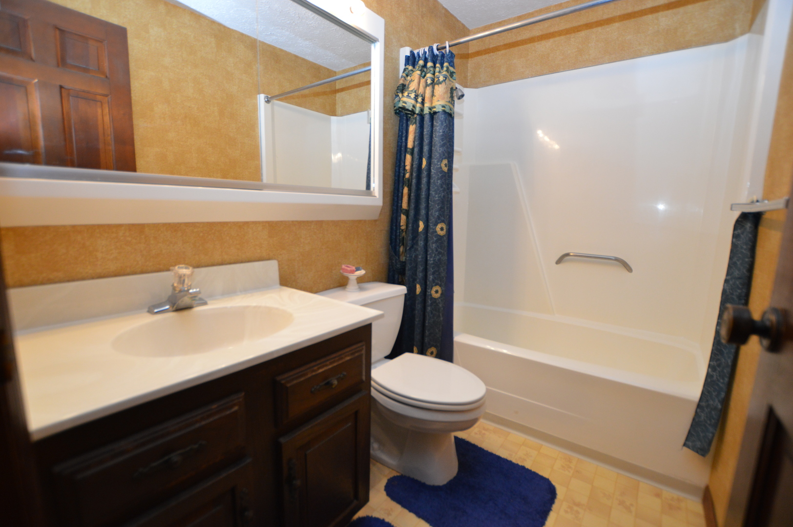 15758 Boone Mc Henry County Line Road Capron, IL 61012 - Photo 25 of 39 a bathroom with a sink a toilet and shower