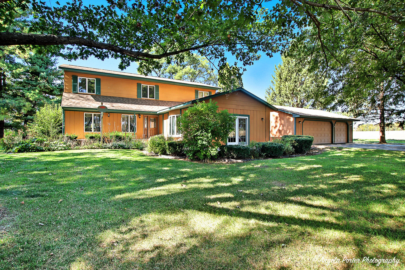 15758 Boone Mc Henry County Line Road Capron, IL 61012 - Photo 38 of 39 a front view of house with yard and green space