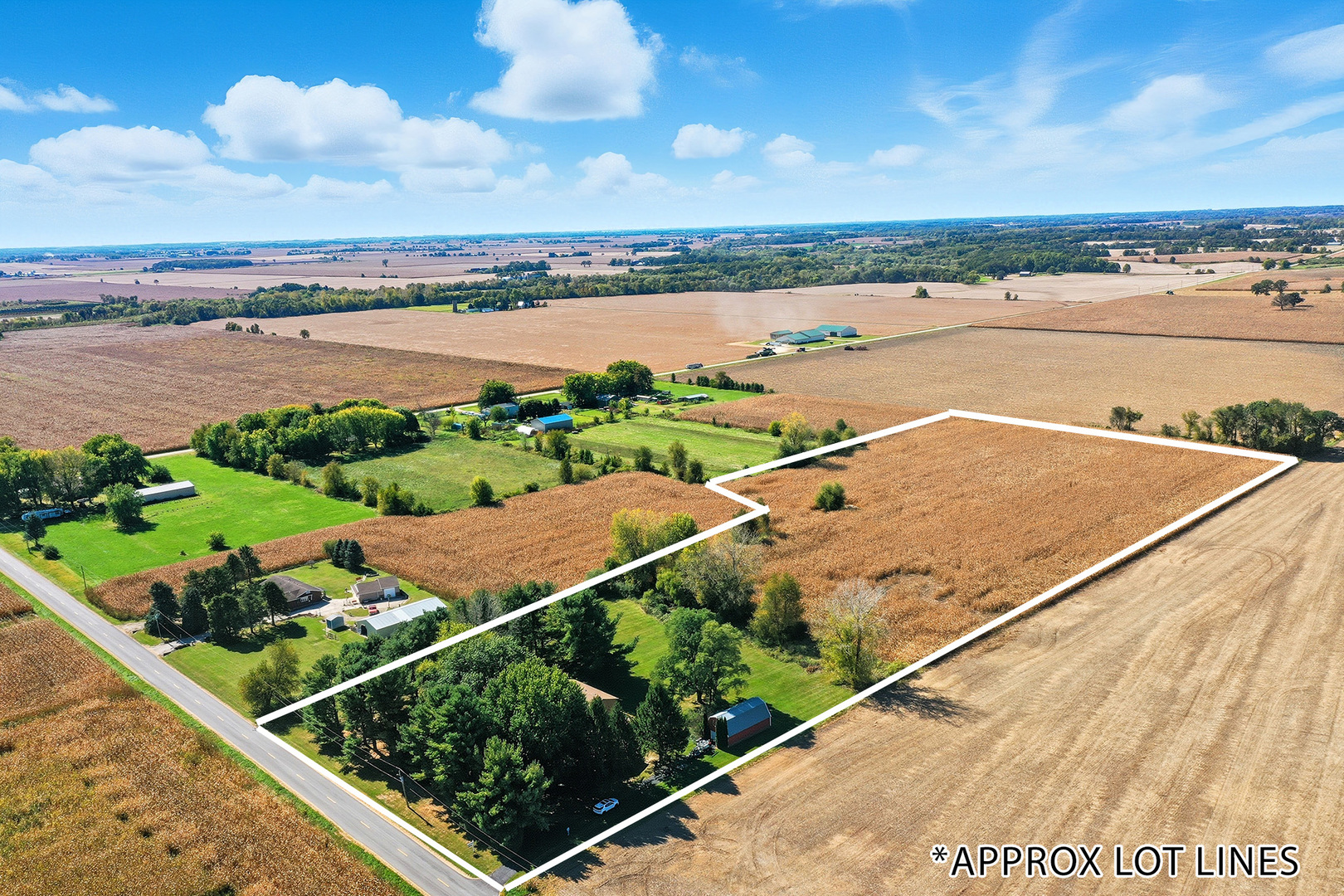 15758 Boone Mc Henry County Line Road Capron, IL 61012 - Photo 5 of 39 a view of a city from a balcony with an ocean view