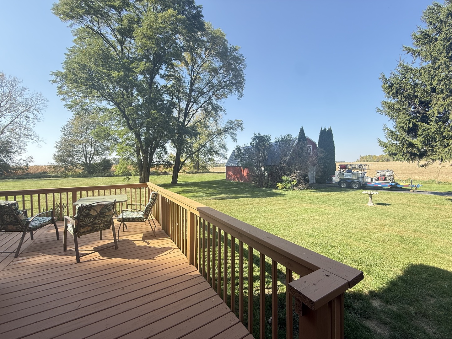 15758 Boone Mc Henry County Line Road Capron, IL 61012 - Photo 7 of 39 a view of a ocean from a deck