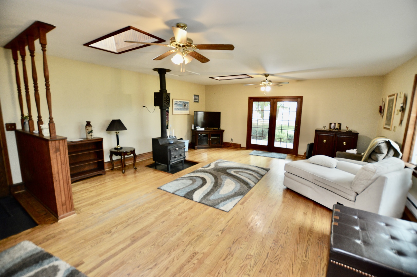 15758 Boone Mc Henry County Line Road Capron, IL 61012 - Photo 10 of 39 a view of a livingroom with furniture and a flat screen tv
