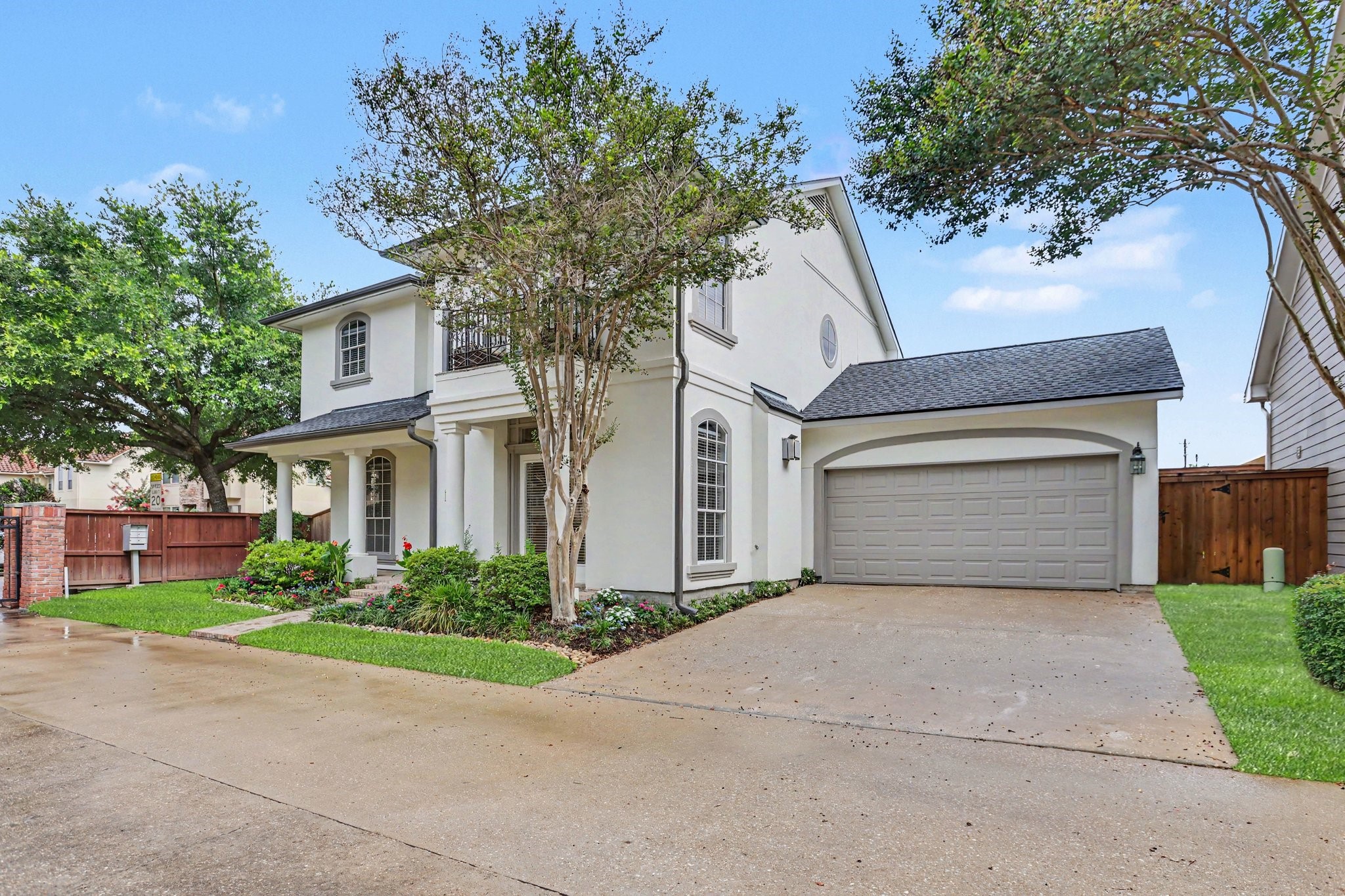 1470 Springrock Lane, Unit 6 Houston, TX 77055 - Photo 2 of 31 Ample parking inside the gated community with a 2 car garage and double-wide driveway.