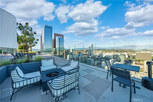 a outdoor living space with furniture and garden view