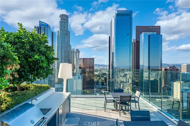 a view of a city with tall buildings