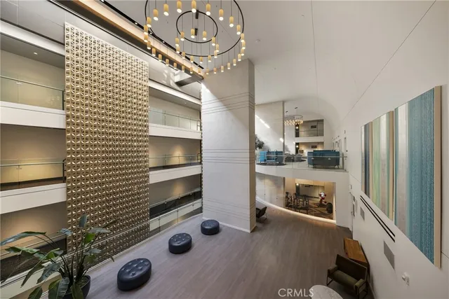 a kitchen with stainless steel appliances wooden cabinets a stove and a refrigerator