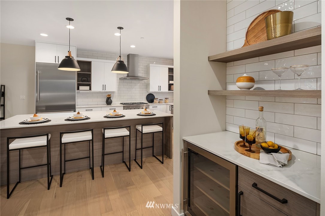 330 3rd Avenue South, Unit B Kirkland, WA 98033 - Photo 13 of 36 a kitchen with a sink cabinets and counter space