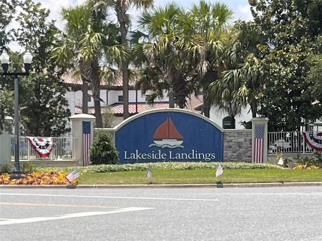 a view of swimming pool with outdoor seating and yard