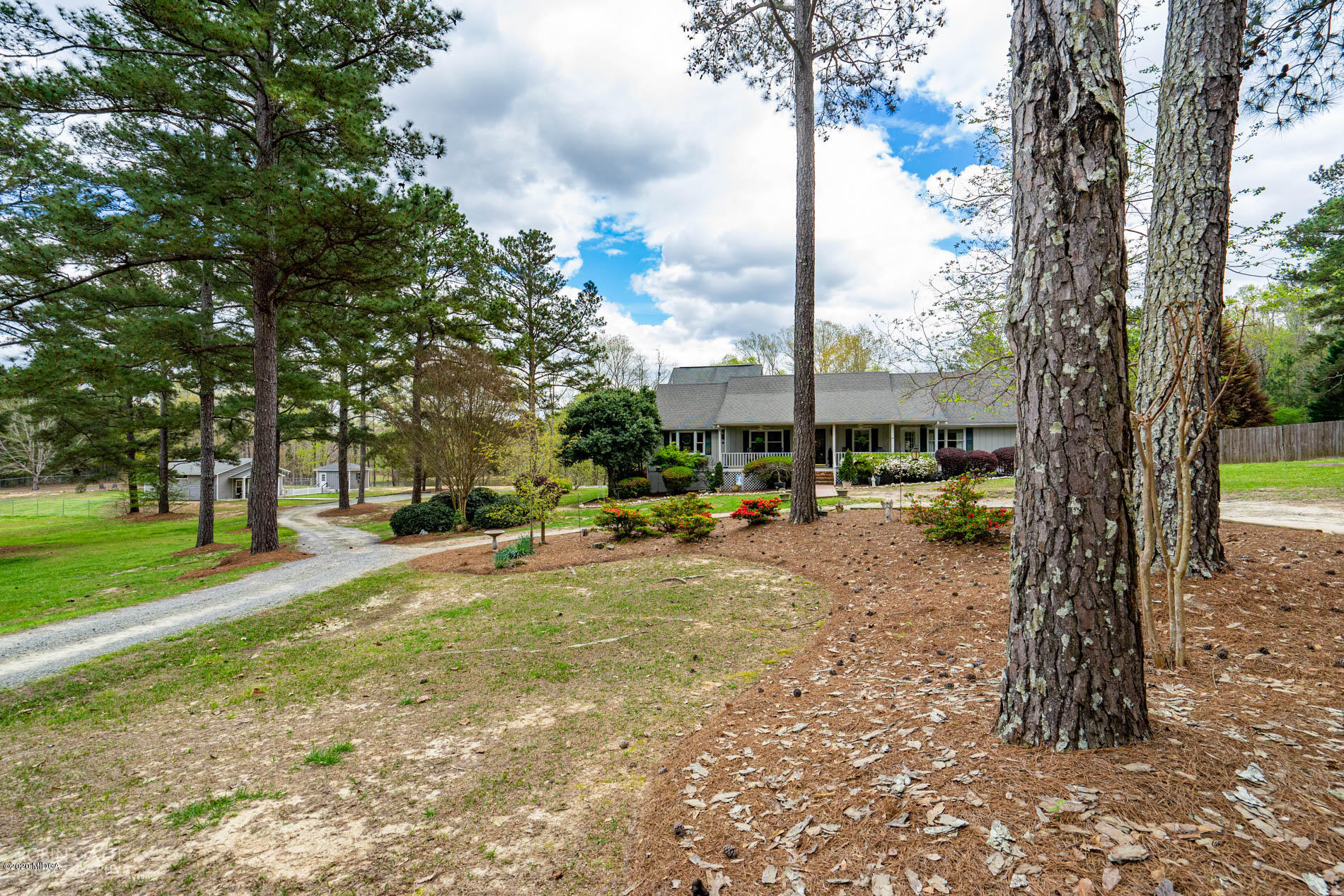 2862 Bonner Gilbert Road Lizella, GA 31052 - Photo 3 of 43 a view of a park with large trees