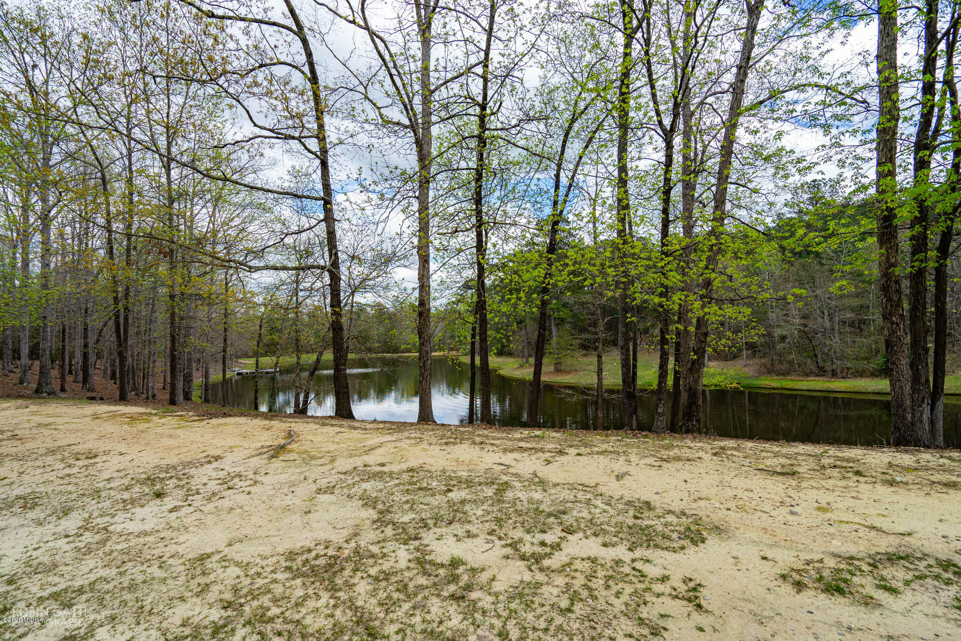 2862 Bonner Gilbert Road Lizella, GA 31052 - Photo 4 of 43 a backyard of a house with a large tree