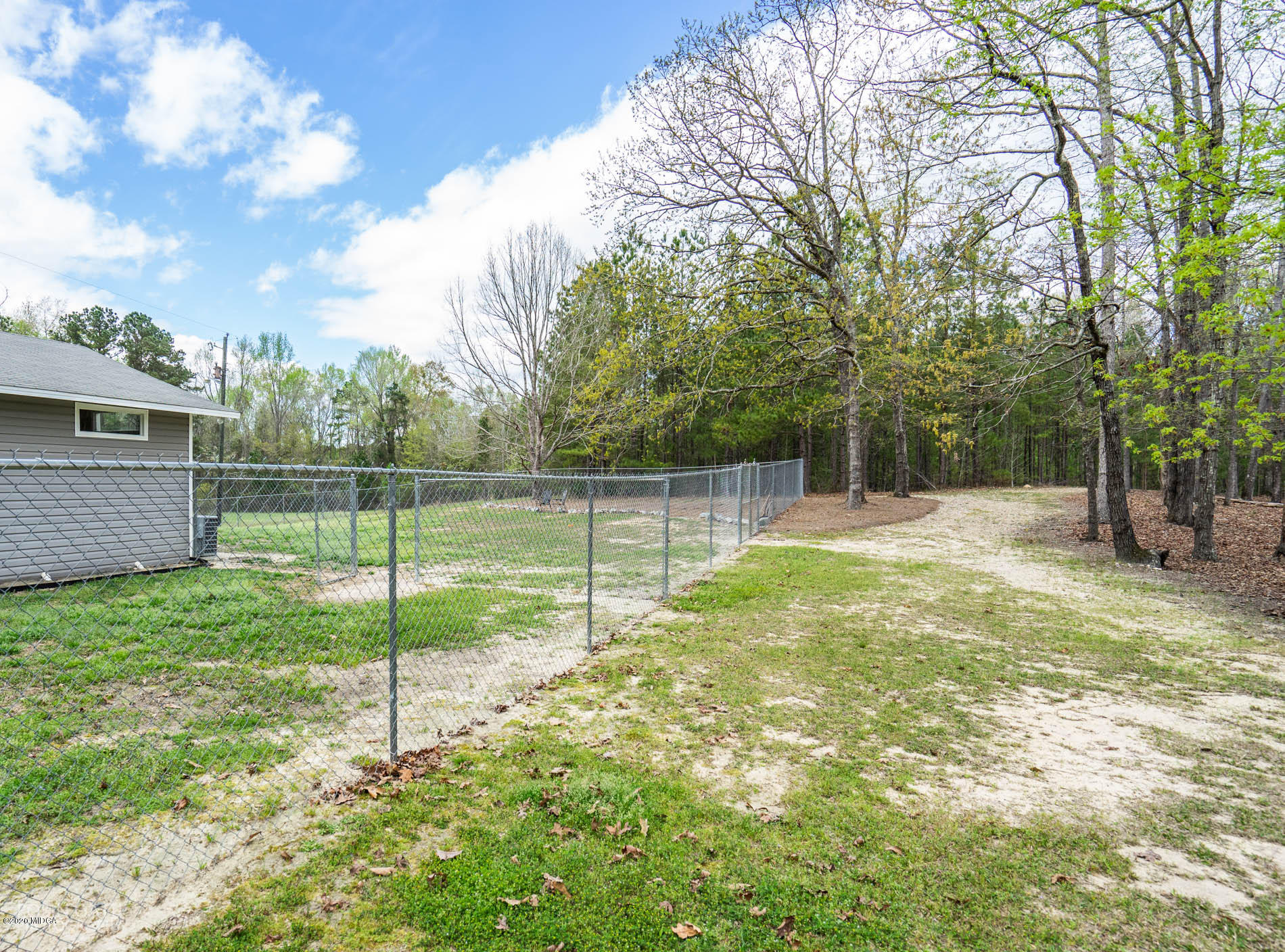 2862 Bonner Gilbert Road Lizella, GA 31052 - Photo 40 of 43 a view of a yard with a tree