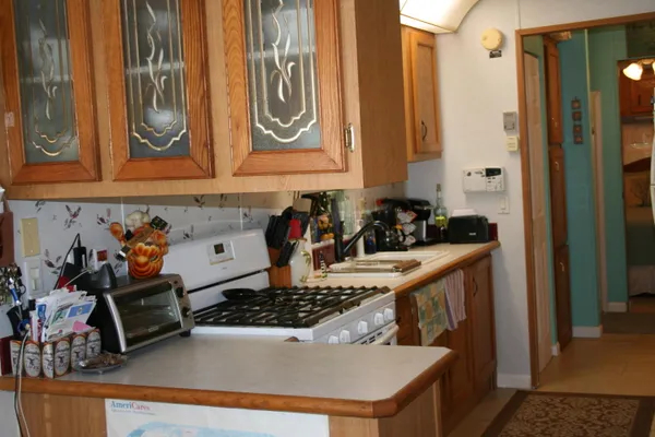 a close view of stove top oven and stove