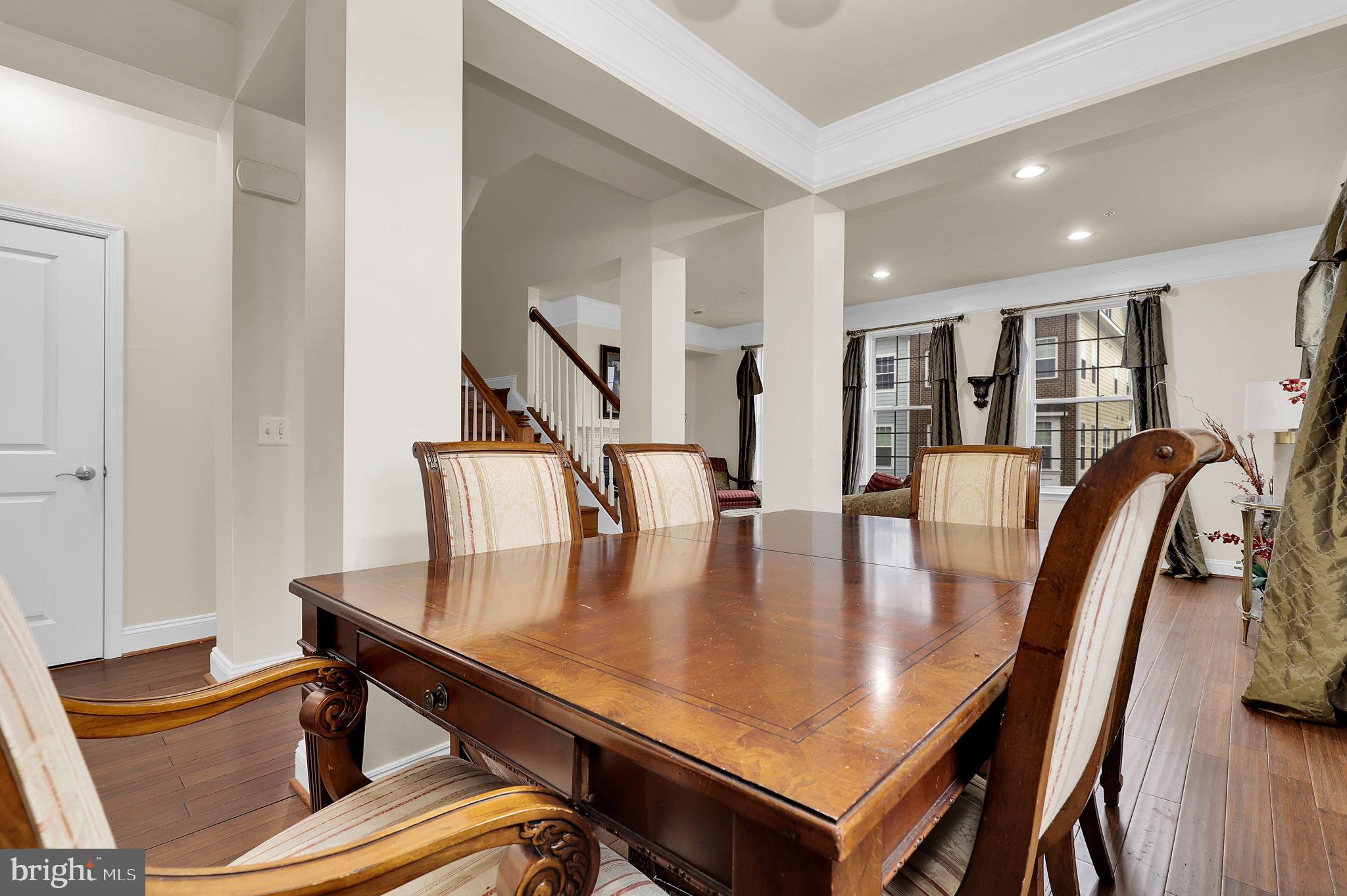 5846 Donovan Lane Ellicott City, MD 21043 - Photo 12 of 31 a view of a dining room with furniture