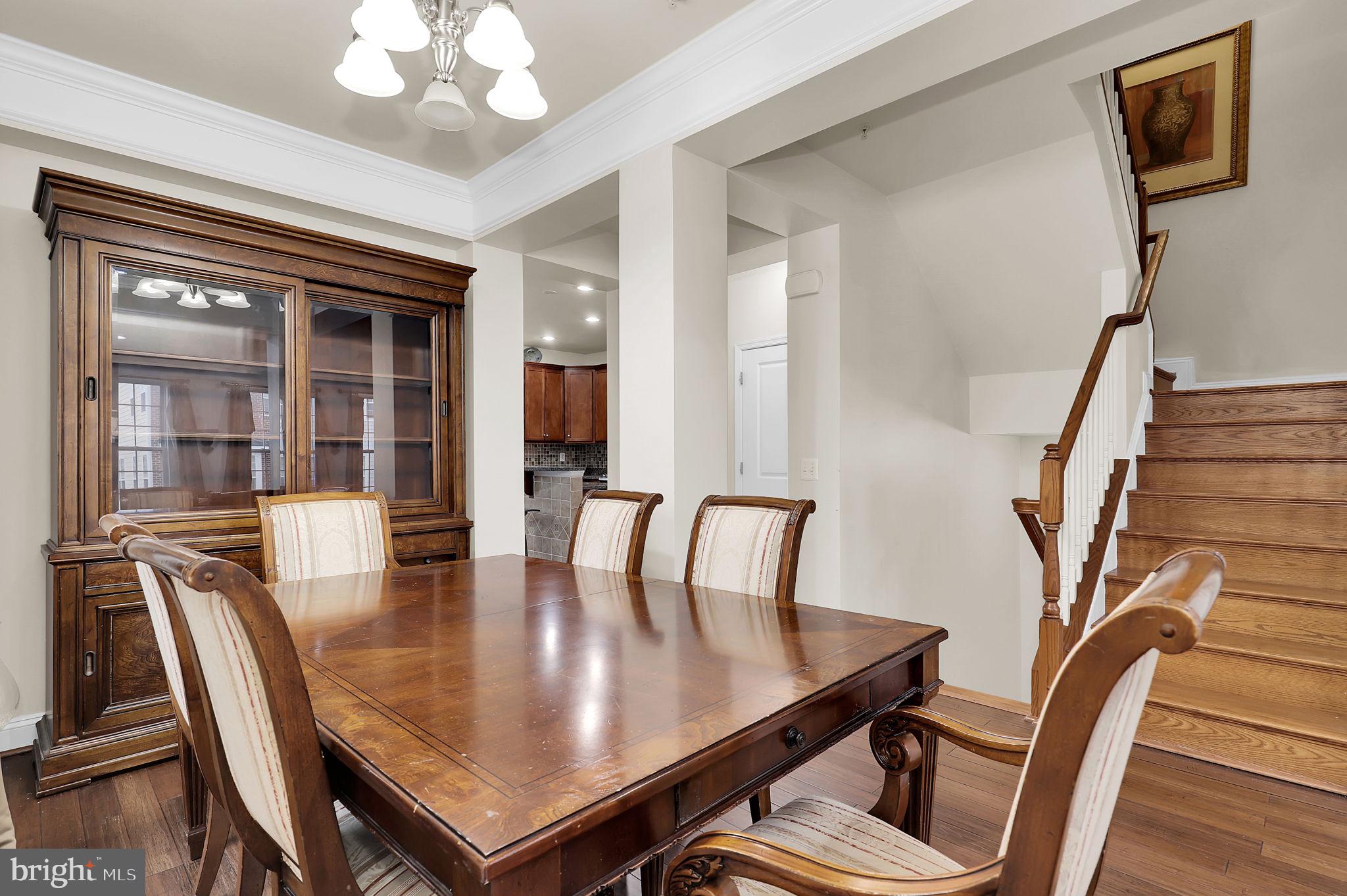 5846 Donovan Lane Ellicott City, MD 21043 - Photo 13 of 31 a view of a dining room with furniture