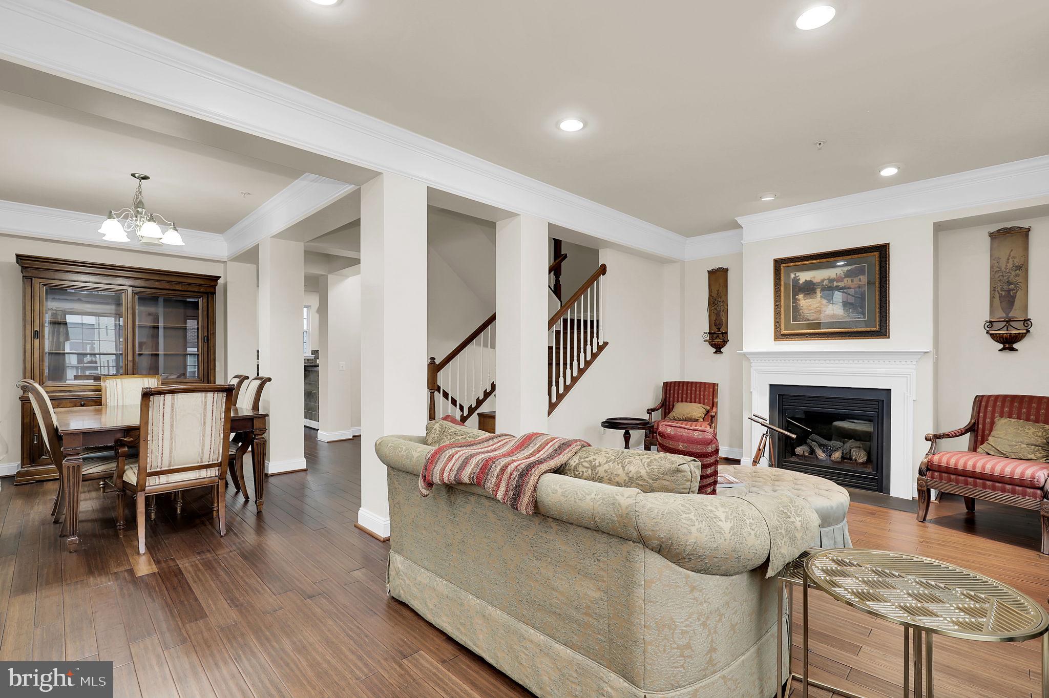 5846 Donovan Lane Ellicott City, MD 21043 - Photo 15 of 31 a living room with furniture and a fireplace