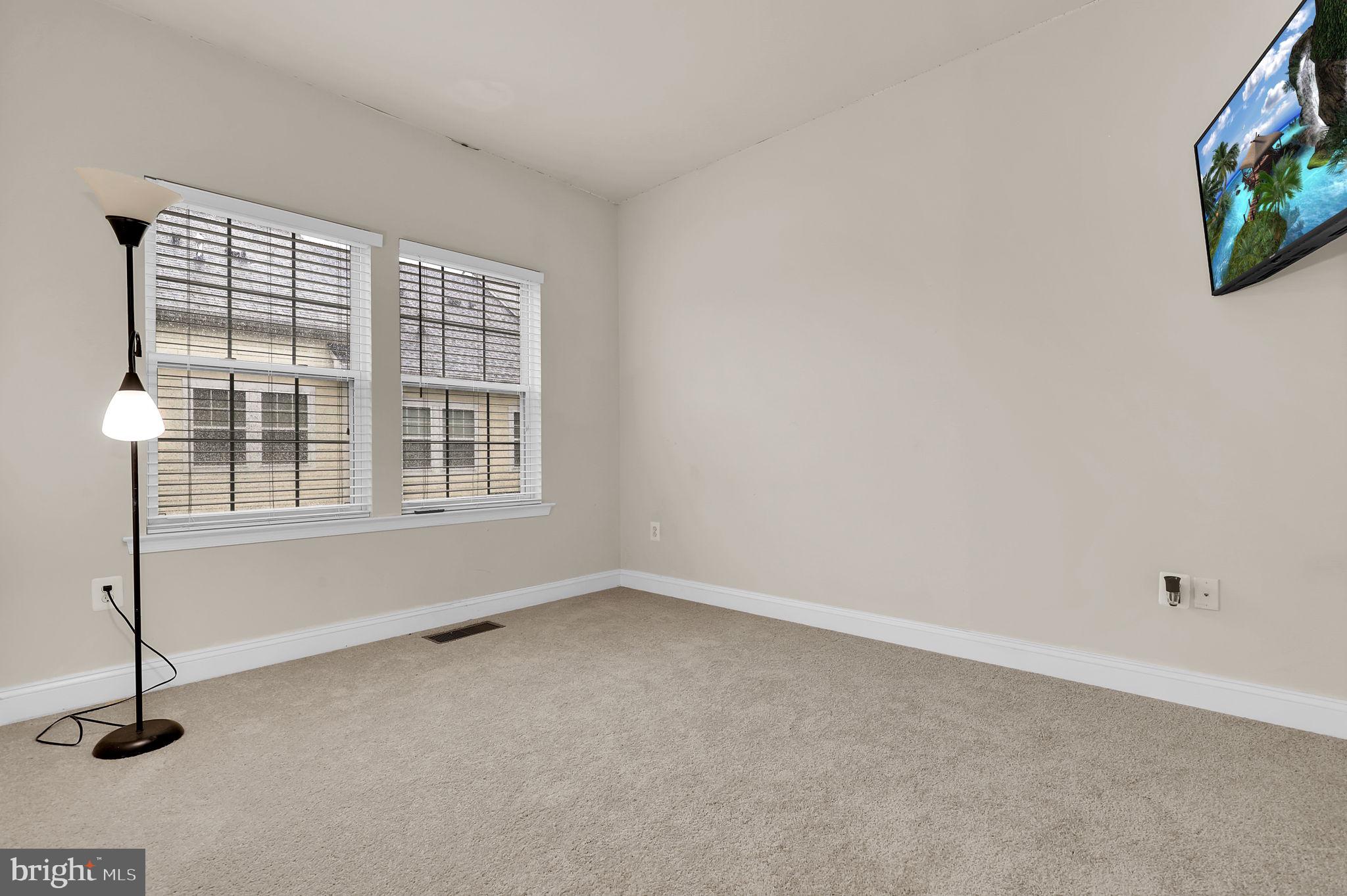 5846 Donovan Lane Ellicott City, MD 21043 - Photo 25 of 31 a view of an empty room with a window