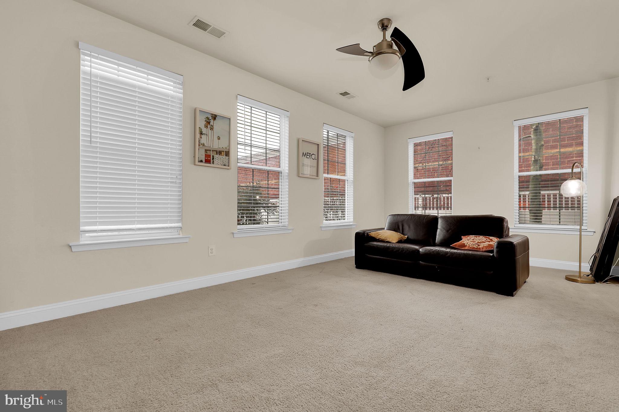 5846 Donovan Lane Ellicott City, MD 21043 - Photo 27 of 31 a living room with furniture and windows