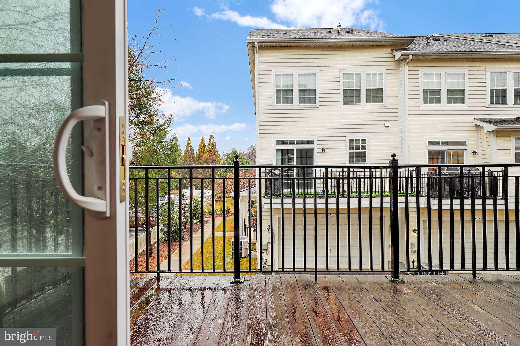 5846 Donovan Lane Ellicott City, MD 21043 - Photo 5 of 31 a view of a balcony with a swing