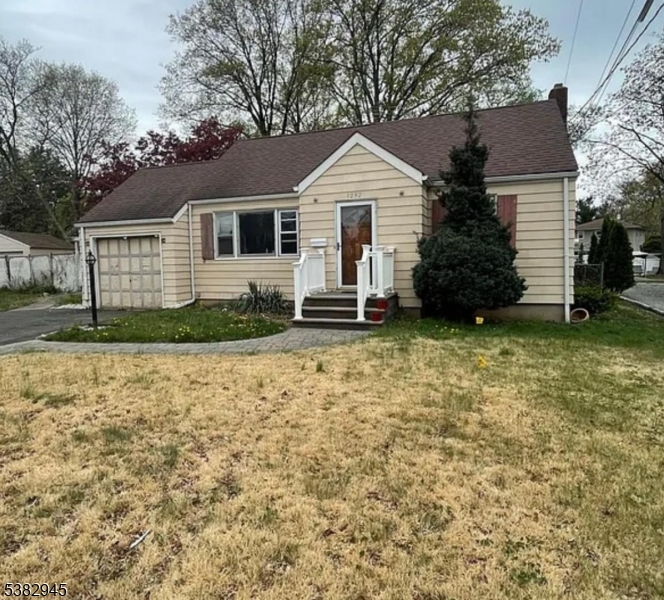 1292 Crescent Avenue Roselle, NJ 07203 - Photo 1 of 35 a front view of a house with a yard