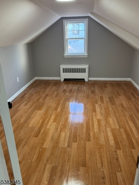 1292 Crescent Avenue Roselle, NJ 07203 - Photo 14 of 35 an empty room with wooden floor