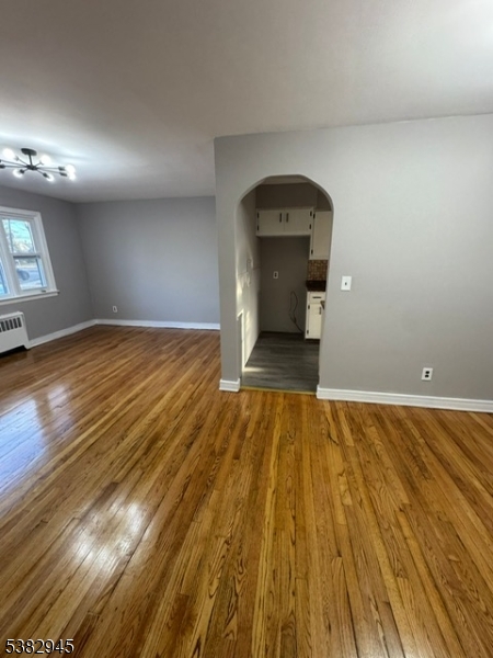 1292 Crescent Avenue Roselle, NJ 07203 - Photo 3 of 35 a view of empty room with wooden floor